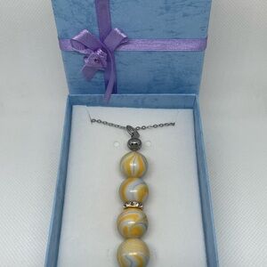Exquisite Gold & Silver Swirl Necklace
Expertly Handcrafted, Exclusively Yours